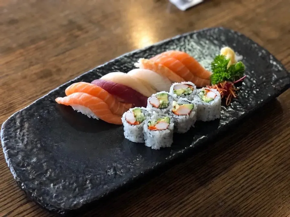 Sushi Lunch A: assorted nigiri with California maki on a stone plate